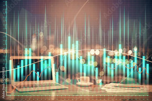 Double exposure of forex chart and work space with computer. Concept of international online trading.