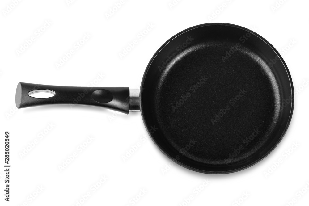 The black fry pan over white background The black fry pan over white background