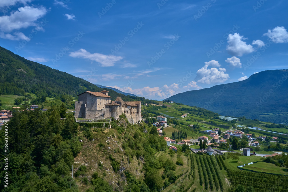 Photo aerial view, The italian town and castel Stenico in northern Italy. An ideal place to travel.