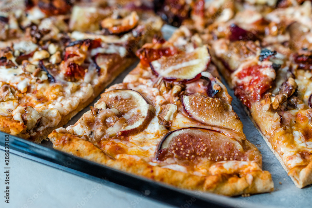 Fig Pizza with Walnut and Sun Dried Tomatoes.