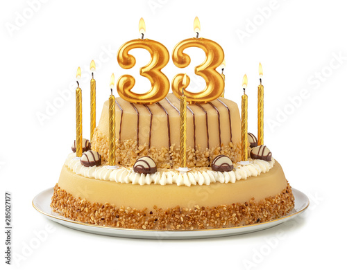 Festliche Torte mit goldenen Kerzen - Nummer 33