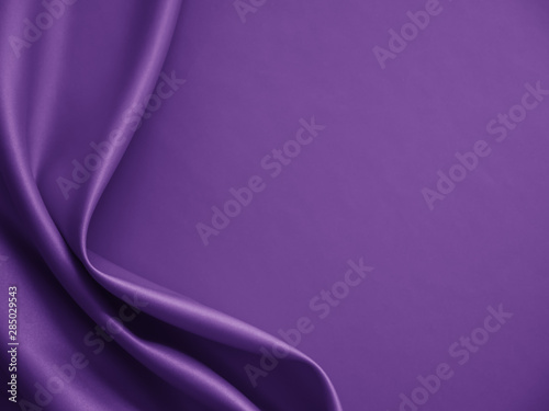 Beautiful smooth elegant wavy violet purple satin silk luxury cloth fabric texture, abstract background design. Card or banner.