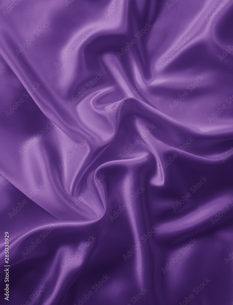 Fototapeta premium Beautiful smooth elegant wavy violet purple satin silk luxury cloth fabric texture, abstract background design. Card or banner.