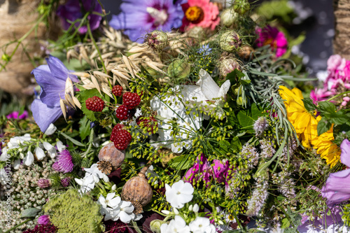 Floristic bouquet of flowers, herbs and fruits that are the symbol of summer