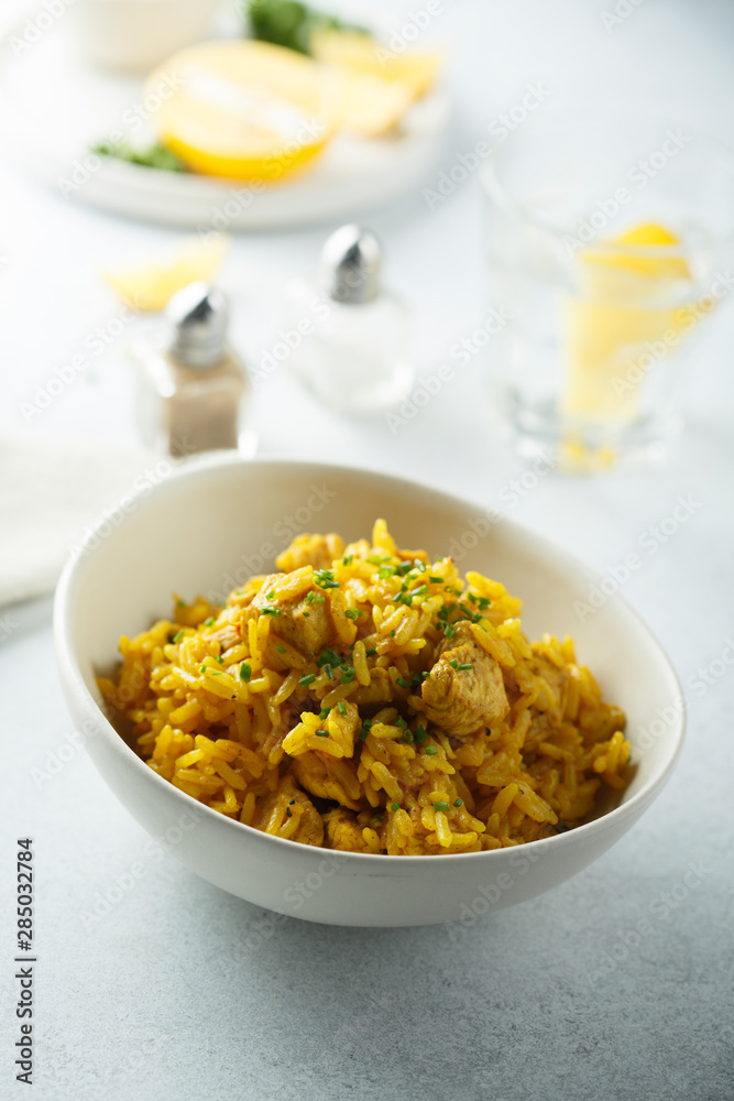 Spiced vegan rice in white bowl