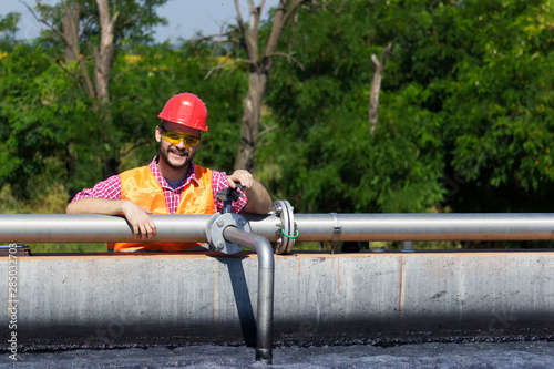Worker smile after valve inspection