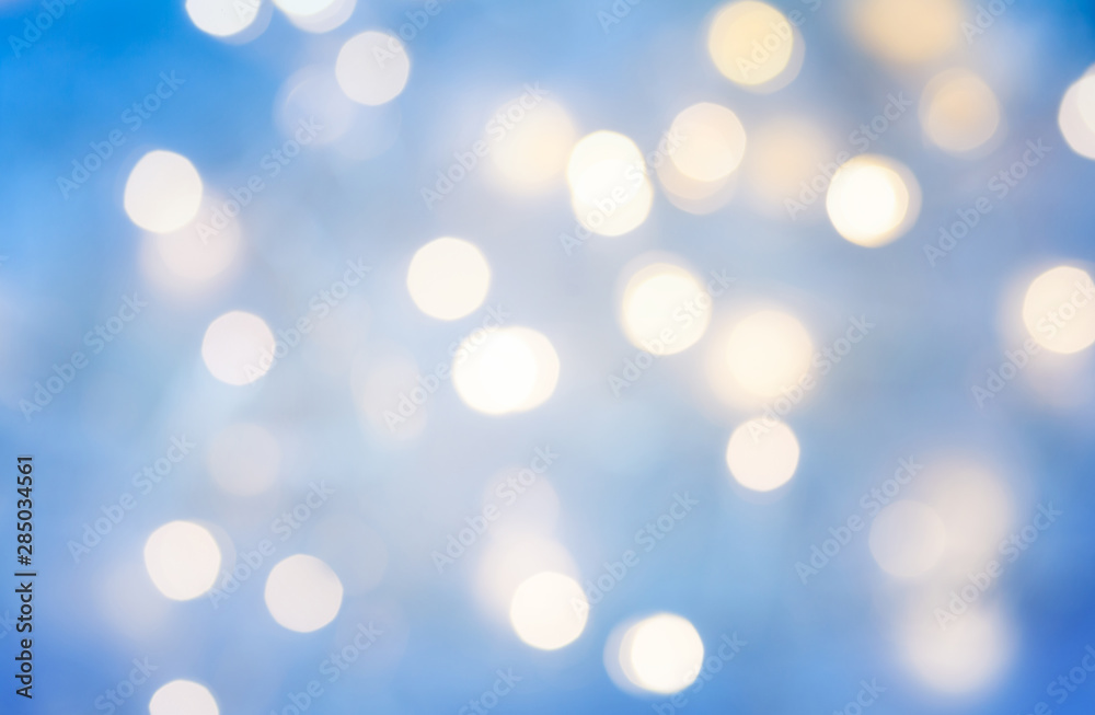 Bokeh background in blue color from holiday lights.