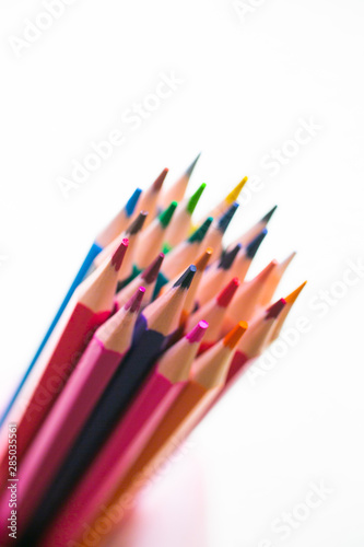 Color pencils with copy space isolated on white background close up view. Back to school.