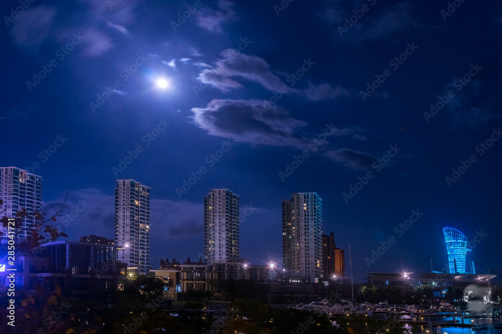 Night city view. Full moon. Sanya China