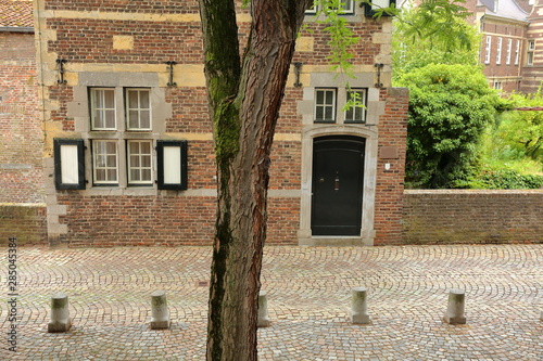 Typical architecture of a 17th century house built over de Jeker river, Limbourg, Maastricht, Netherlands photo