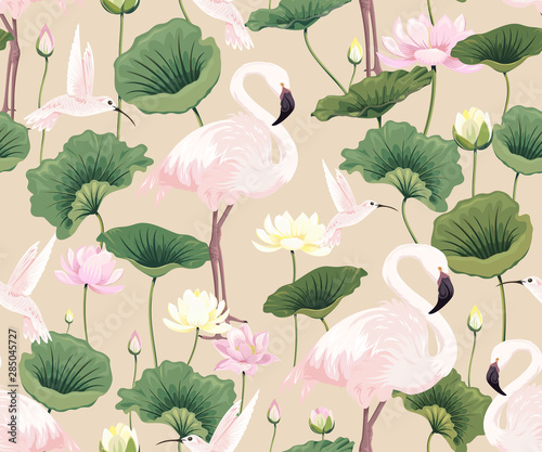 Seamless pattern with pink flamingos, hummingbirds and lotuses