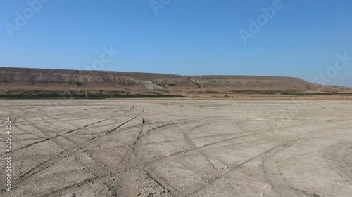 Flying above the bottom of a dried lake to the foot of Klementyev Mountain CRIMEA AUGUST 2019 photo