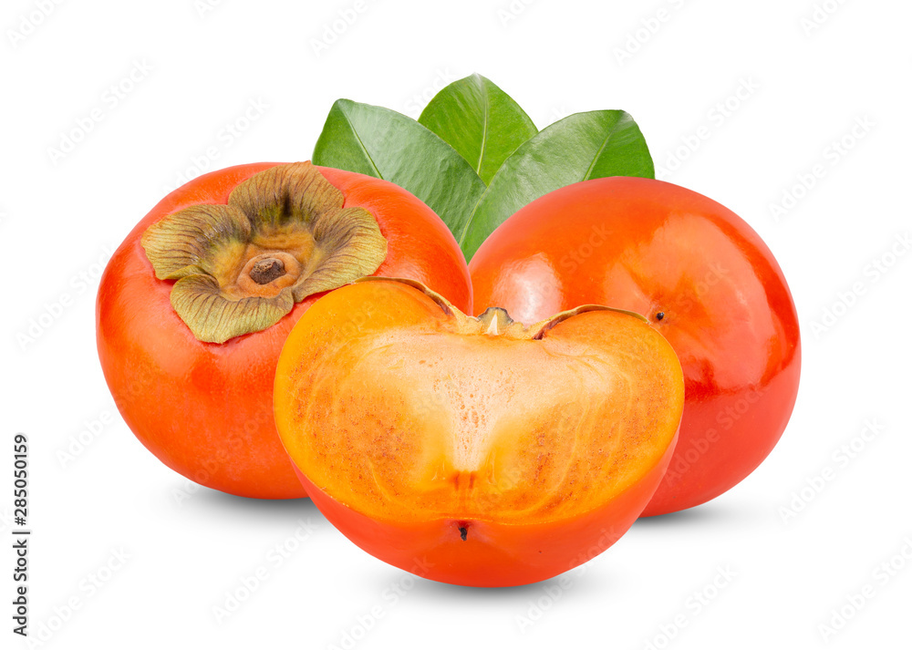 ripe persimmons with leaf isolated on white background. full depth of field