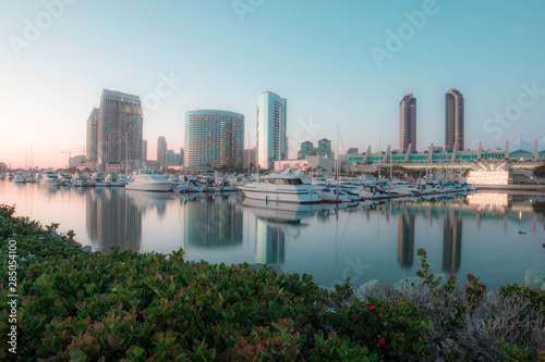 boats in a pier at san diego waterfront with the convention center #285054100
