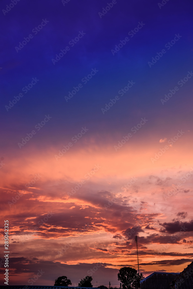 Beautiful sunset with clouds on the sky