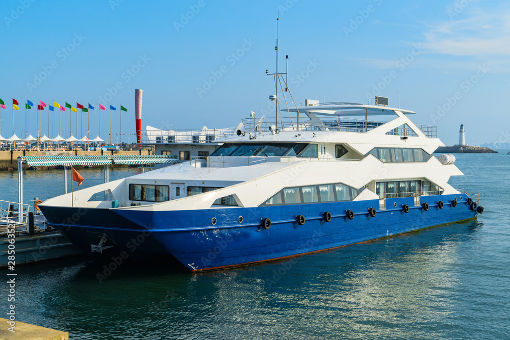Fototapeta premium Luxury yacht moored in port, Qingdao, China