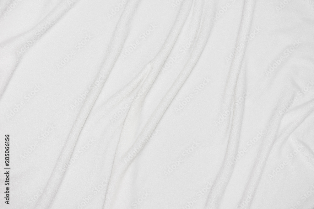 White crumpled blanket, texture, top view