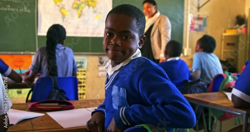 Schoolchildren in a lesson at a township school 4k photo