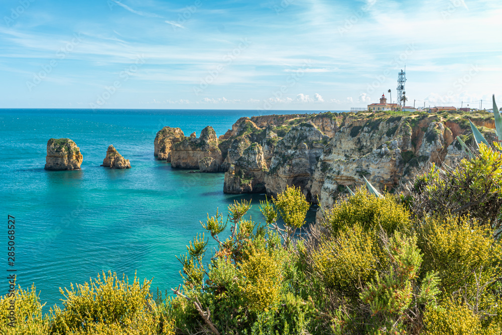 View to lighthouse on Ponta da Piedade in Lagos, Algarve, Portugal.