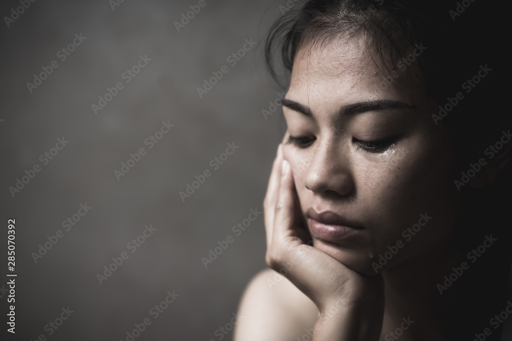 © Tinnakorn - Woman sitting and crying. The concept of stopping violence against women andand human trafficking, Stop sexual harassment and rape, International Women's Day © Tinnakorn - Woman sitting and crying. The concept of stopping violence against women andand human trafficking, Stop sexual harassment and rape, International Women's Day