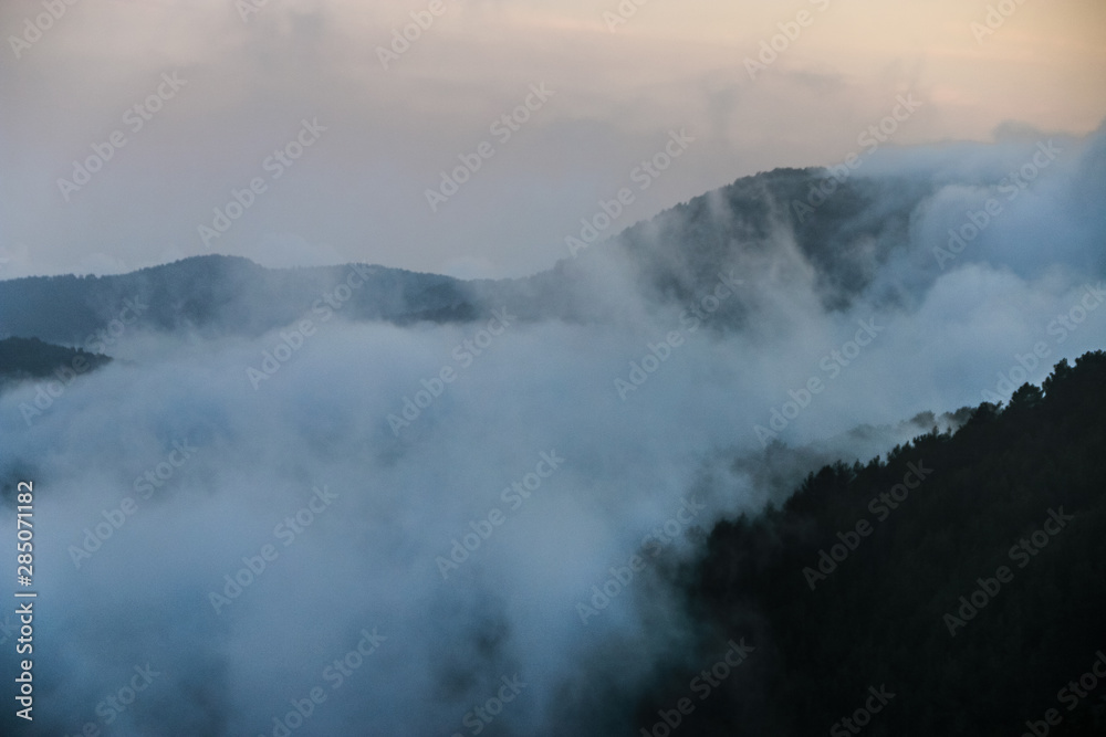 aerial view of foggy mountains