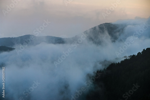aerial view of foggy mountains © Pixamin