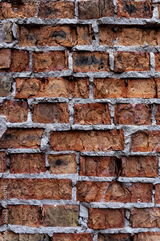Old red brick wall, rustic, shattered texture, design vertical background. Old red brick wall, rustic, shattered texture, design vertical background.