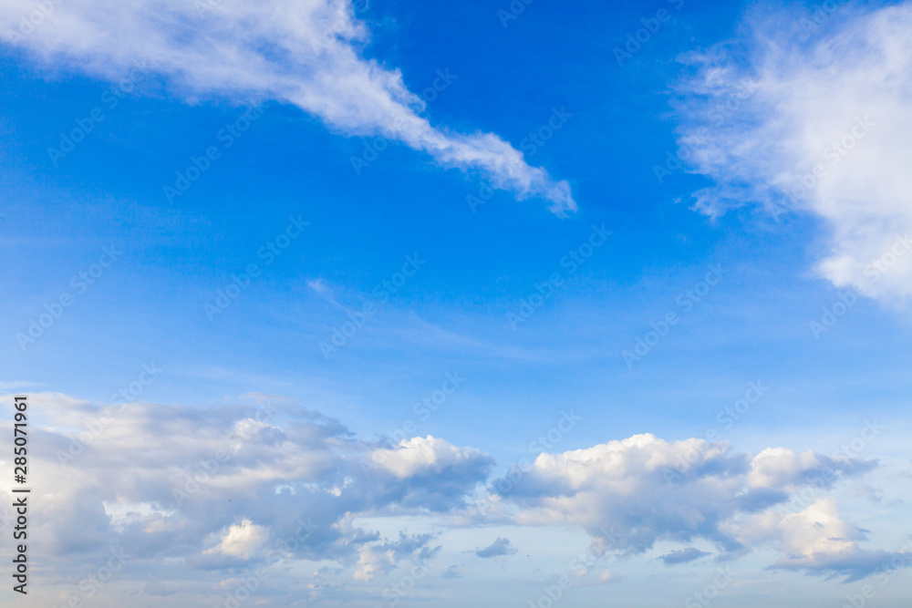 blue sky with clouds background. Cloud and against clear blue sky.