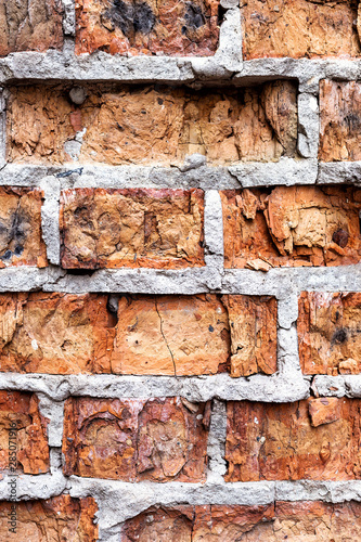 Old red brick wall, rustic, shattered texture, design vertical background.