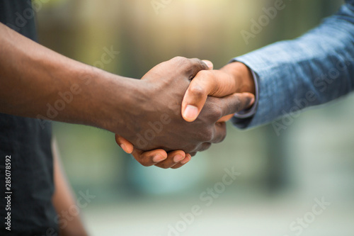 handshake of two african young men