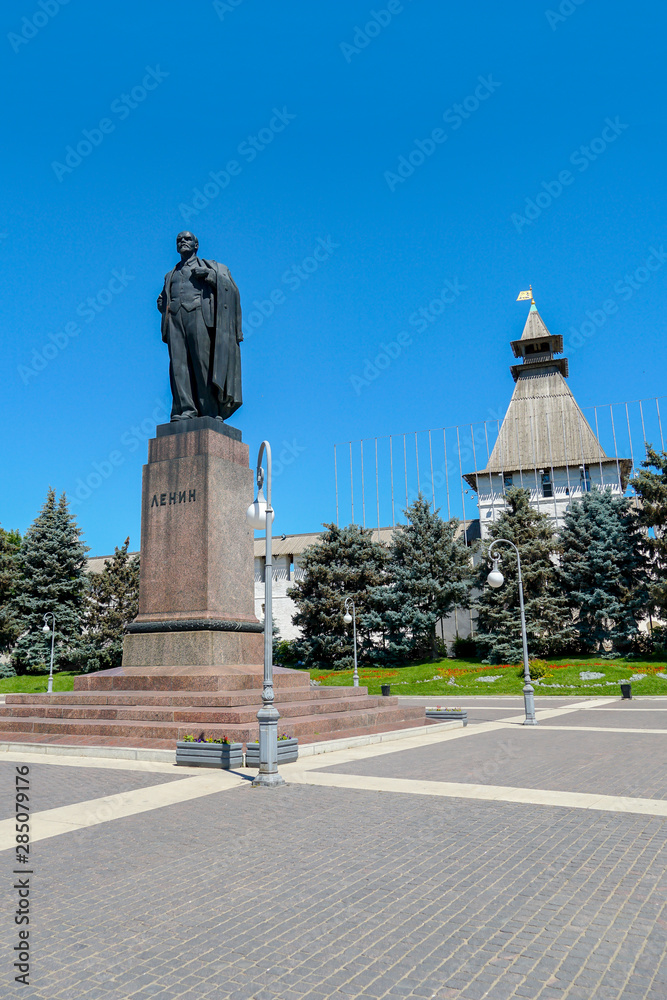 Astrakhan / Russia - June 13, 2019: monument to Vladimir Ilyich Lenin on Lenin Square on the background of the Astrakhan Kremlin, Astrakhan