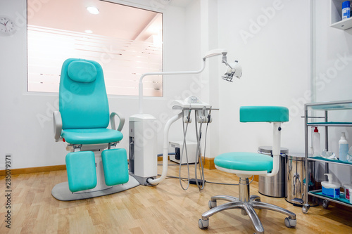 Obraz na płótnie Specialistic chair in the modern podologist office w salonie