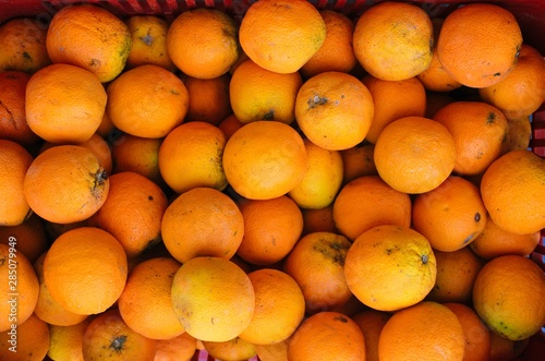 Fresh ripe oranges background photo