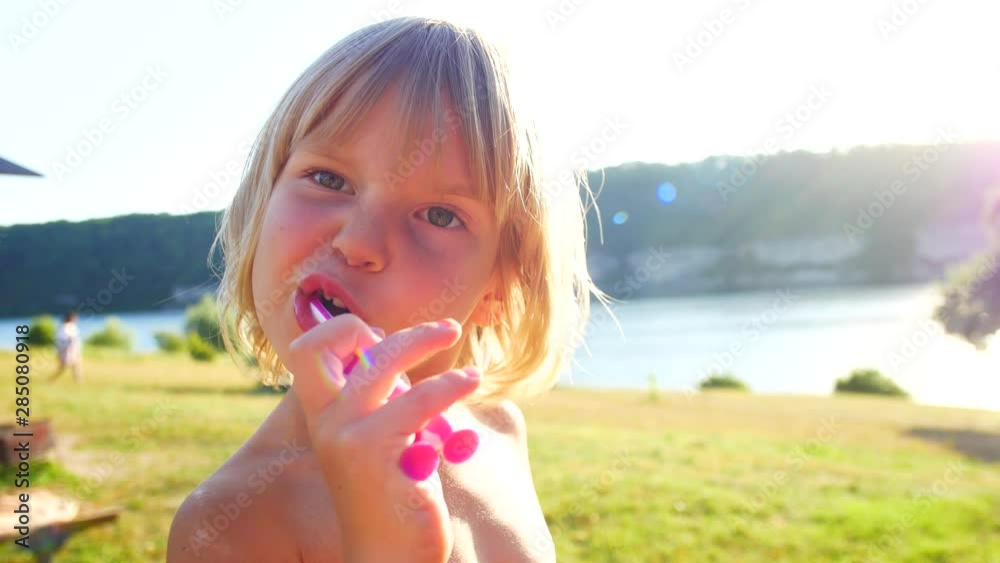 Children brush their teeth. Hygiene at a family picnic. Children brush their teeth. Hygiene at a family picnic.