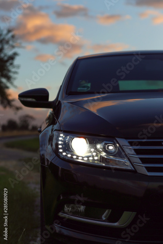 car headlights lit at night, headlights at night