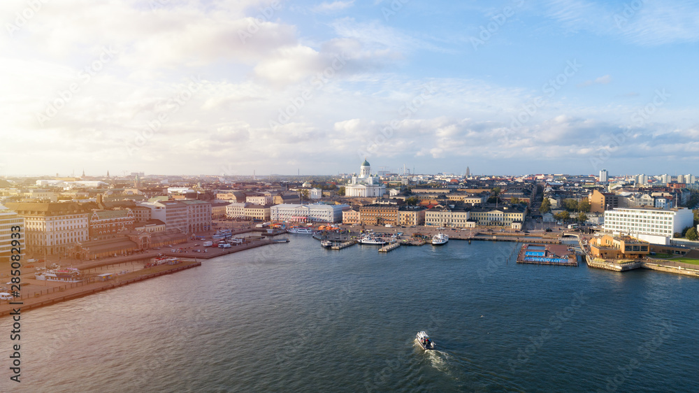  Aerial view of beautiful city Helsinki at Autumn. Famous Helsinki Cathedral and Market square in evening light, horizon, autumn skyline.