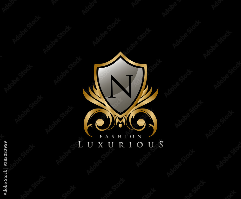 Luxury Golden Shield Logo with N Letter, royal shield logo icon. Luxury Golden Shield Logo with N Letter, royal shield logo icon.