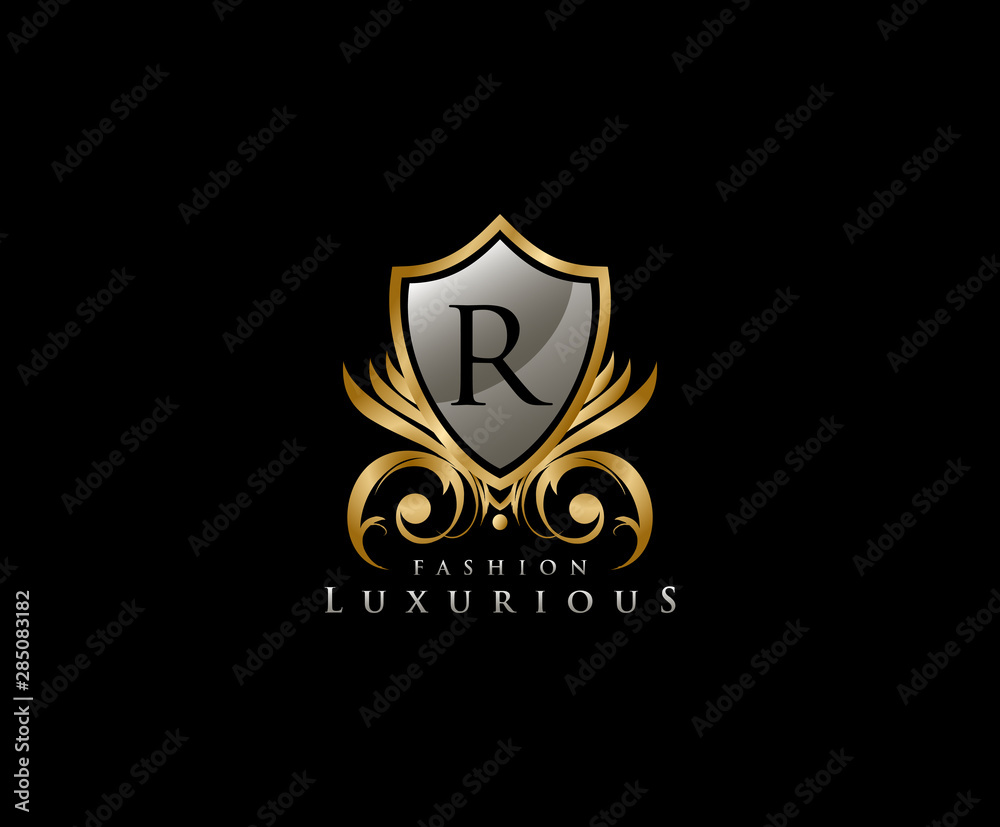 Luxury Golden Shield Logo with R Letter, royal shield logo icon. Luxury Golden Shield Logo with R Letter, royal shield logo icon.