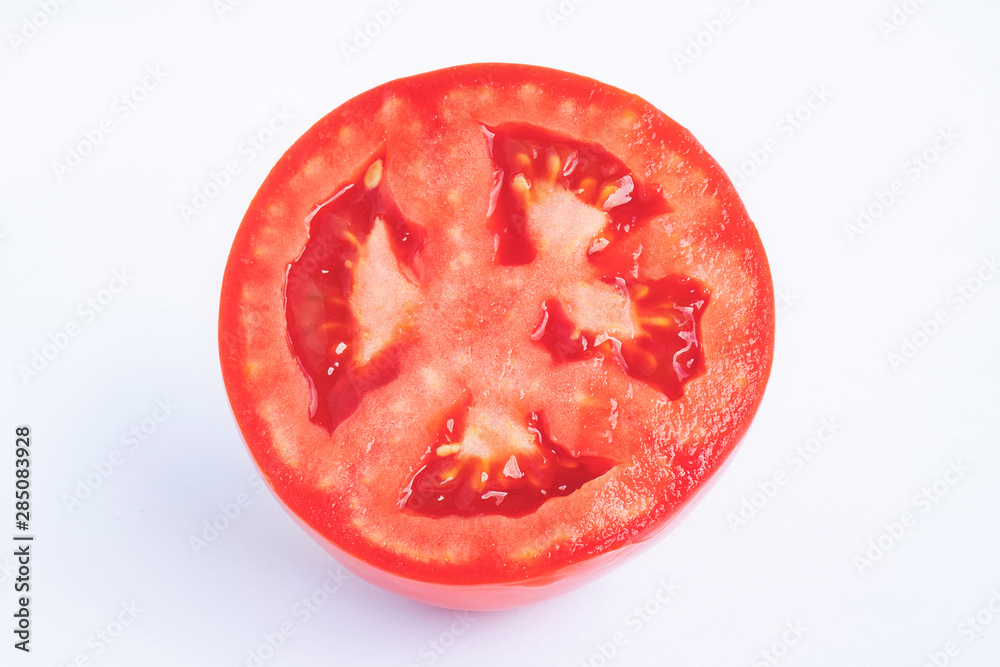 Tomato slice isolated on white background, top view Tomato slice isolated on white background, top view