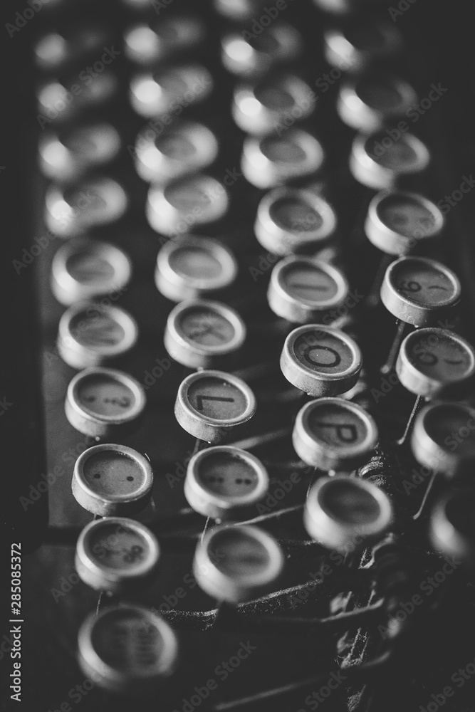 Close up image of the keys on an old vintage typewriter Close up image of the keys on an old vintage typewriter
