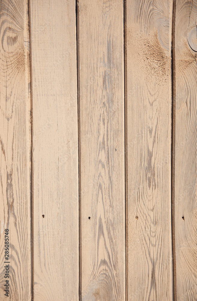 Fototapeta premium Background texture of old beige painted wooden lining boards wall