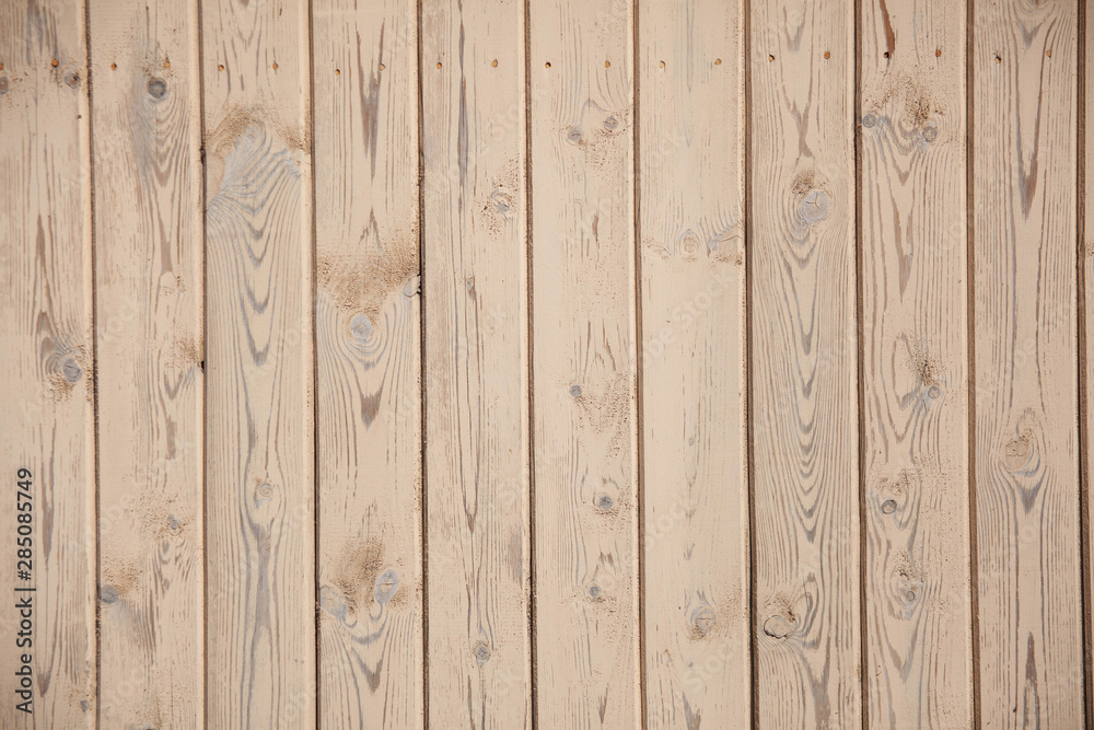 Background texture of old beige painted wooden lining boards wall Background texture of old beige painted wooden lining boards wall