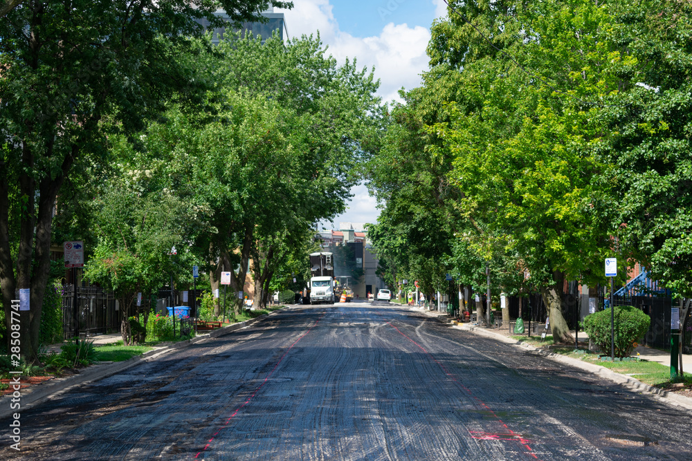 Residential Street being Paved with Asphalt in Logan Square Chicago