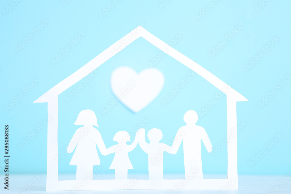 Family and house figures with heart on blue background Family and house figures with heart on blue background