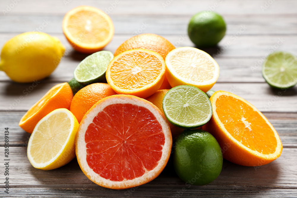 Citrus fruits on wooden table Citrus fruits on wooden table