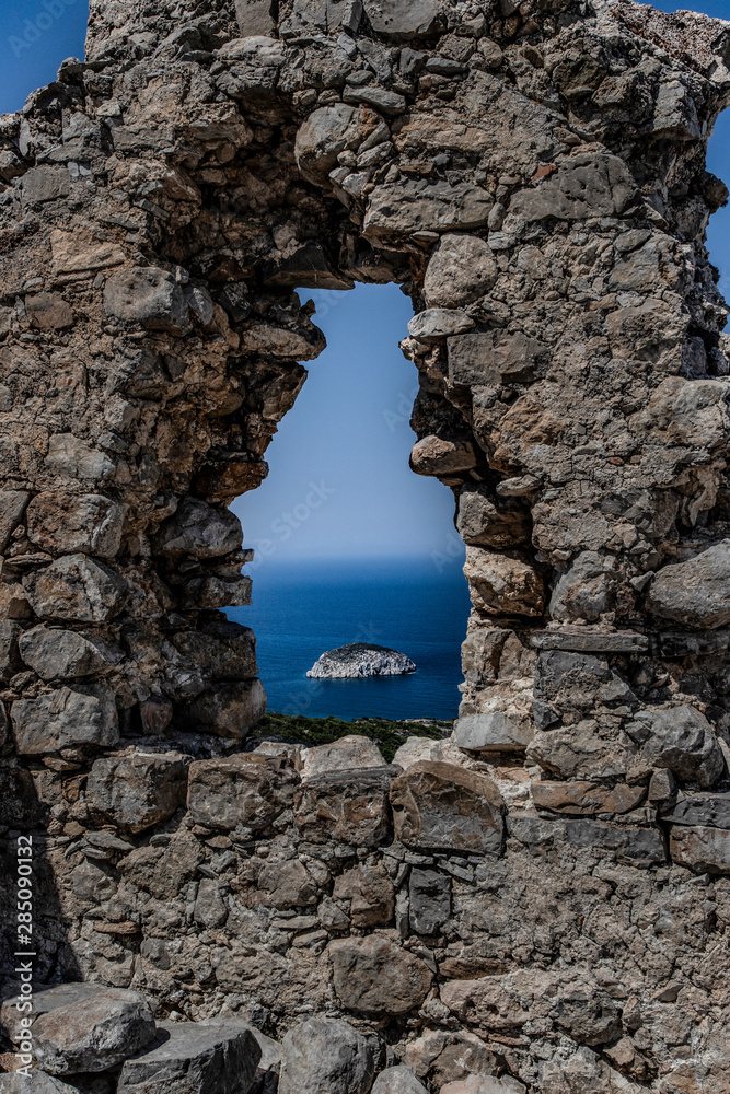 Monolithos knights castle overlooking the Mediterranean sea from hilltop. Rhodes, Greece.