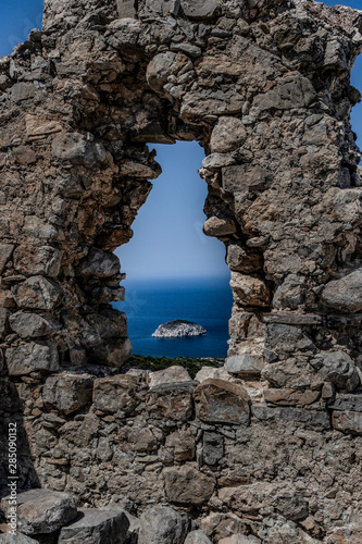 Monolithos knights castle overlooking the Mediterranean sea from hilltop. Rhodes, Greece.
