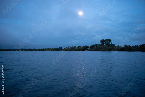 Moonrise on Trombeta's River - Amazônia, Brazil photo