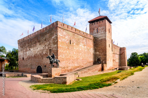 The only remaining brick-built medieval fortress. In front of the castle is a horse statue in the summer sun. Gyula dating in Hungary, Gyula