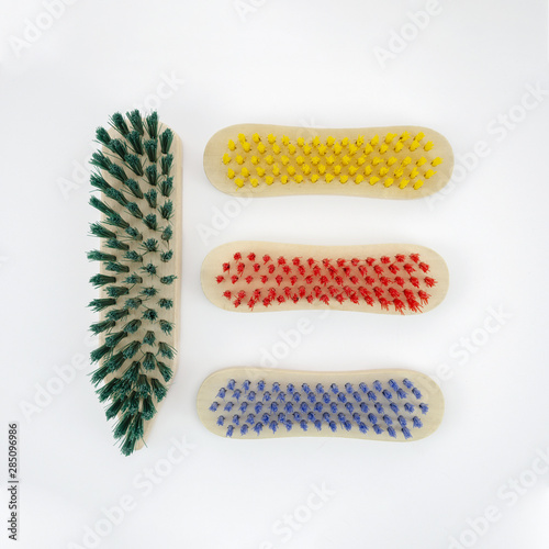 Top view arrangement with colourful brushes photo